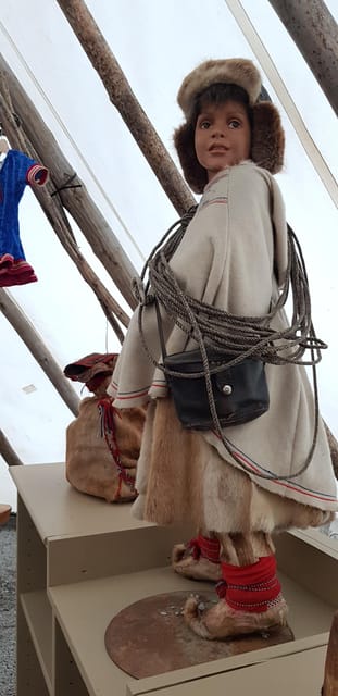 Alta: Sami Cultural Experience with Lavvu and Reindeers - Hands-on Sami clothing: learn by trying, then asking why