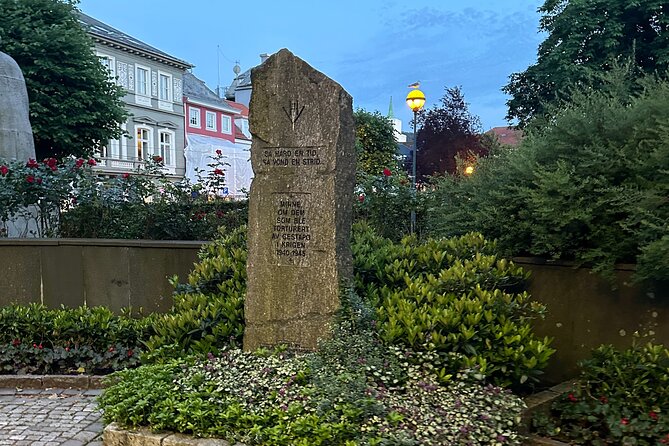 Audio Walking Tour in Bergen Famous Ghosts Location - Old town hall stop: dungeons and hangings