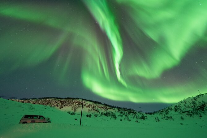 Aurora Hunt with the campfire and professional photographer - Thermal suit comfort: what you get and what you still need