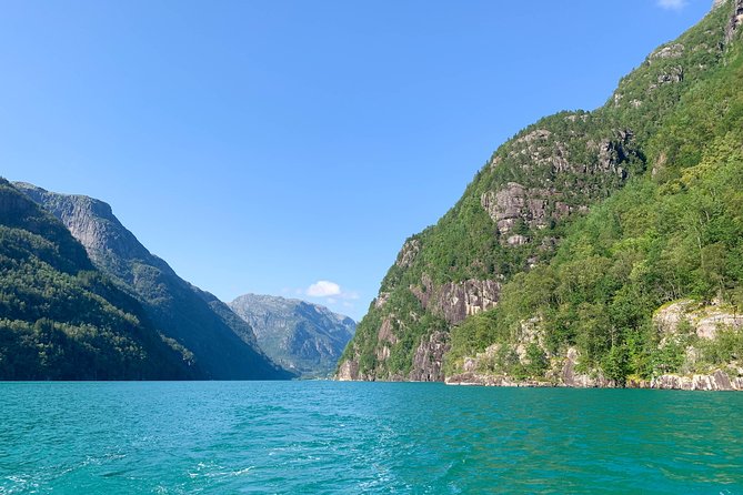 Bergen to Hardangerfjord VIP car + private yacht Fjord cruise - Passing under the Fyksesund suspension bridge, then getting into the fjord’s “in-between” zone