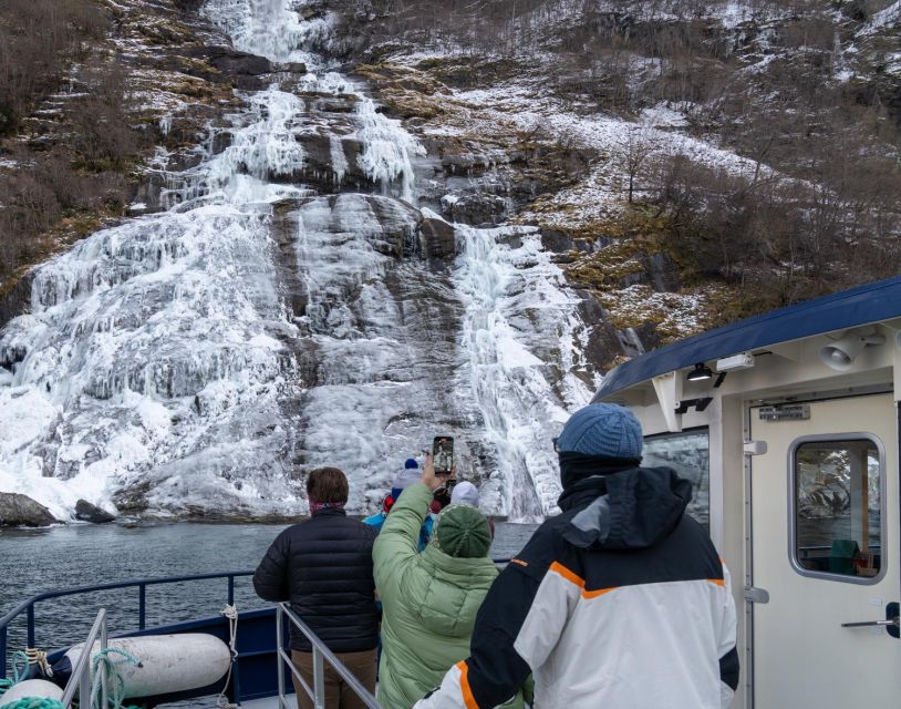 From Ålesund: Winter Fjord Cruise to Geirangerfjord - Cruising the last stretch of Geirangerfjord under waterfalls