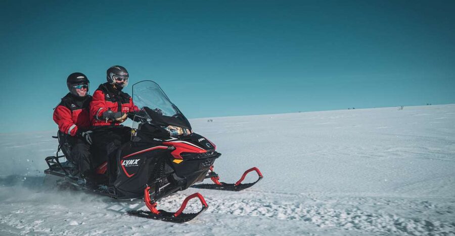 From Alta: Daytime Snowmobile Adventure - Your ride starts in Alta, then shifts to Gargia Valley lodge life