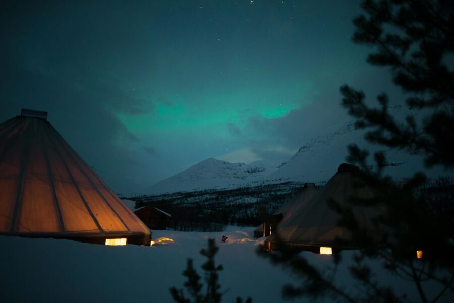 From Tromsø: Evening Snowmobiling Tour at Camp Tamok - The Bus Ride to Tamok Sets the Tone for Night Riding