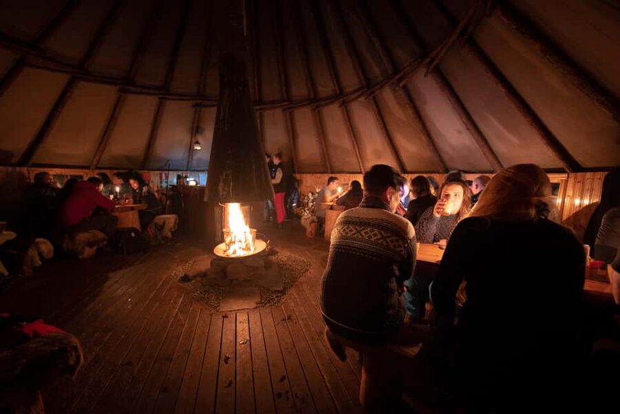 From Tromsø: Northern Lights Visit at Camp Tamok - When the sky allows it, short walks to nearby viewing spots