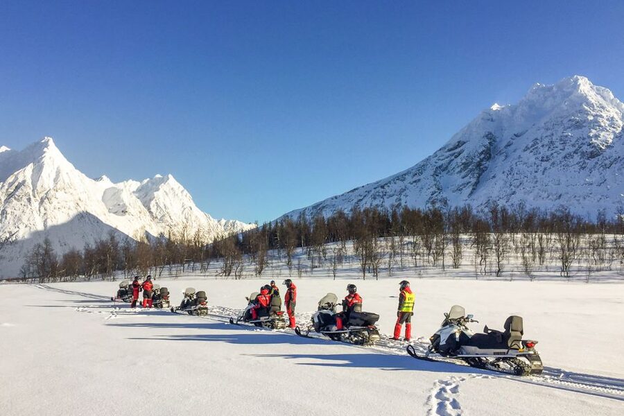From Tromsø: Snowmobile Safari in the Lyngen Alps - Warm Soup, Hot Drinks, and Campfire Time at the End