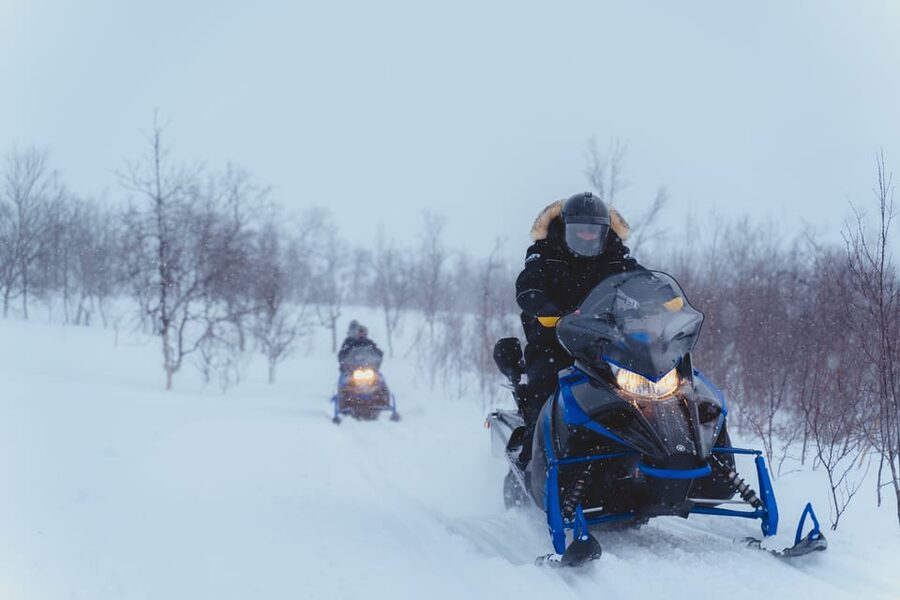 From Tromsø: Snowmobiling Tour at Camp Tamok - Huskies and reindeer at the camp: why it adds meaning