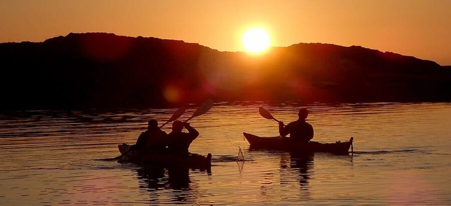 From Tromsø: Sommarøy Midnight Sun Sea Kayaking Tour - The white sandy beach landing on uninhabited islands