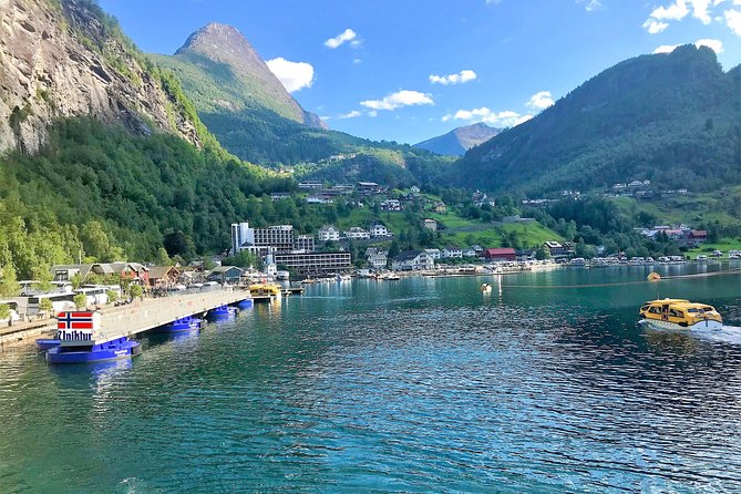 Geiranger by Royal route, 5 hours with visiting a high-mountain farm - Westerås Restaurant, reserved cliffside-style dining with fjord views