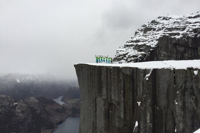 Guided winter hike to Pulpit Rock Preikestolen - Reaching Preikestolen: the edge photo and the fog factor
