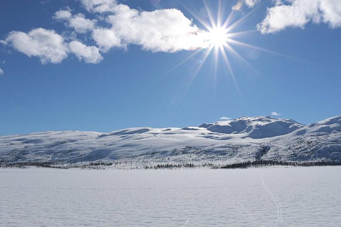 Ice Fishing On The Fjord - Basecamp on the Lyngen Alps: Cozy Food, Warm Drinks, and Real Stories