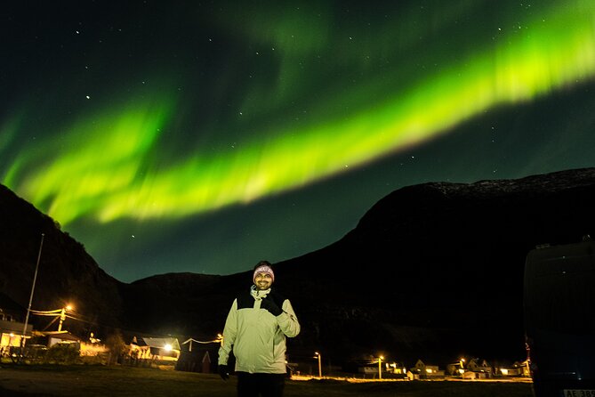 Northern Lights Chase with Sámi & local storytelling - The light-free camp: bonfire, warm meal, and waiting smart