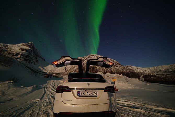 Northern lights - TeslaX Ecofriendly Car - What the guide adds: local stories and “make the night work”