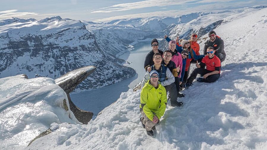 Odda: Trolltunga Winter Hike on Snowshoes - Reaching Trolltunga: the winter rock viewpoint with Folgefonna on the horizon