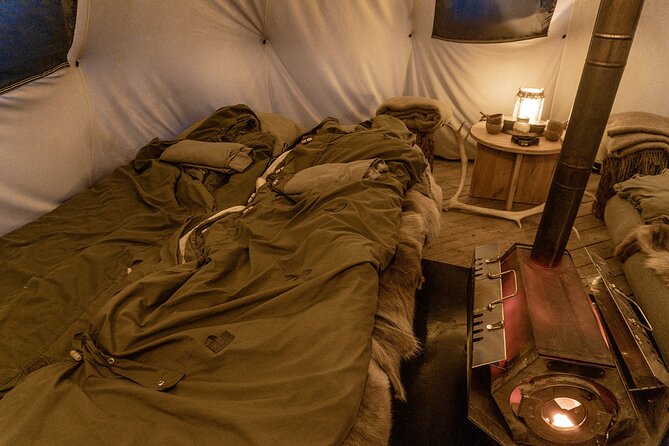 Overnight Stay with Reindeer Sledding & Feeding - Dinner in a lavvu: Sami stew, hot drinks, and real stories