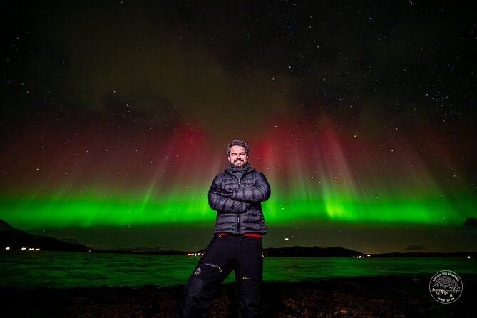 Private Northern Lights Chase with Photography from Tromsø - Staying warm with gear, hot drinks, and a bonfire pause