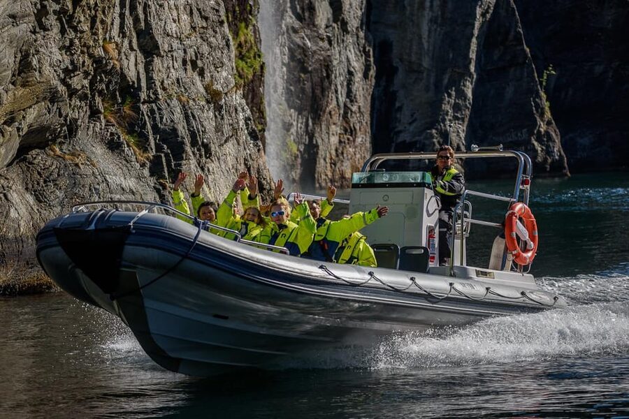 RIB Geiranger - Fjordsafari - Meeting at Geiranger Brygge and getting ready for spray and wind
