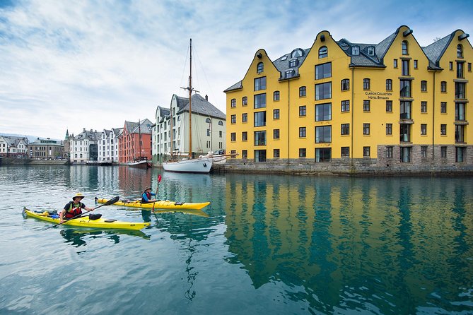 Sea Kayaking In Ålesund - Paddling past Brosundet, where the city feels close
