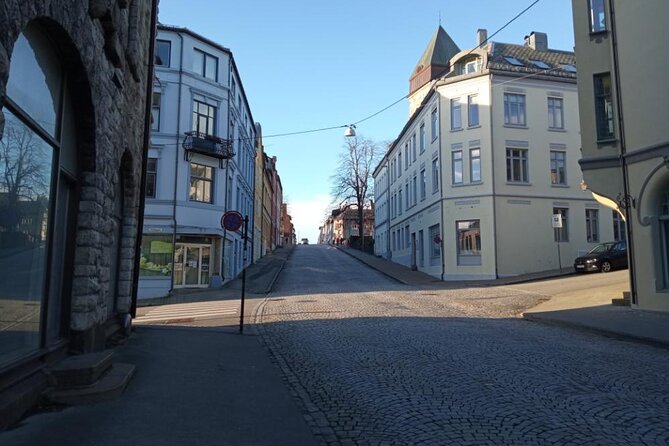 The Essence of Ålesund Self-Guided Walking Tour - Kremmergaarden: Where Modern Shopping Meets Old-Style Character
