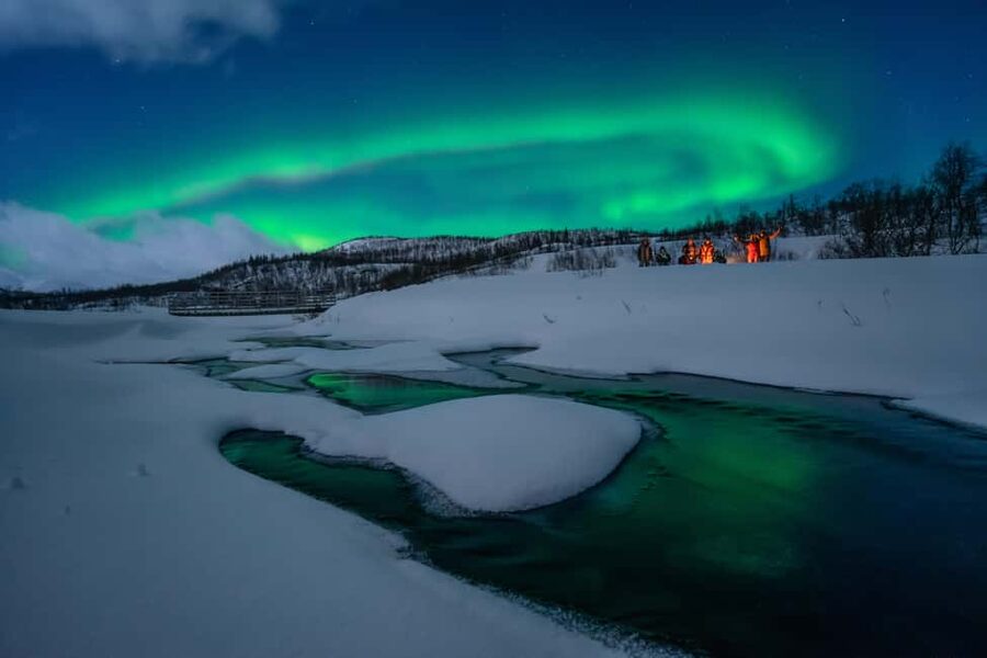 Tromsø: A Sámi Survival Story and Aurora Hunt - The heated minivan micro-group (max 8) sets the pace for a real night out
