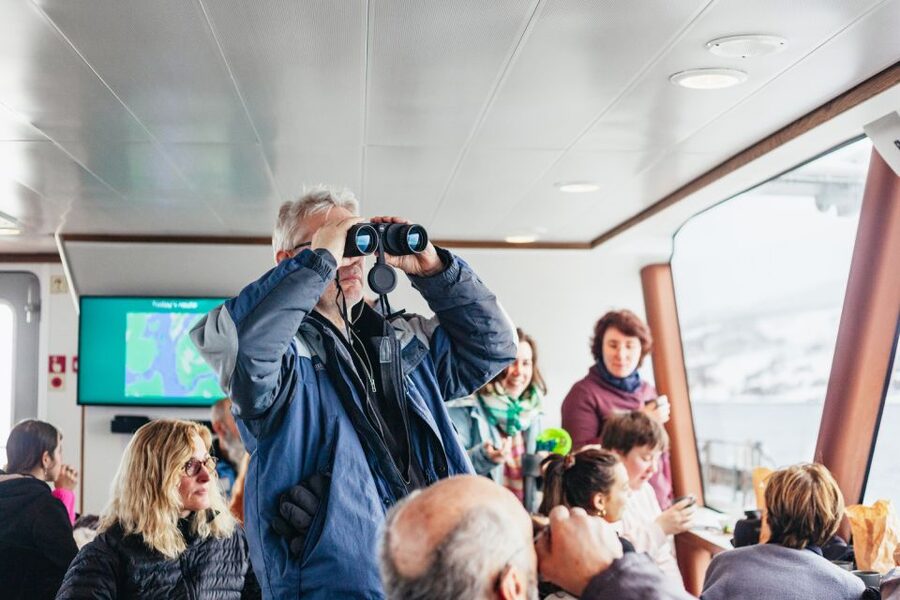 Tromsø: Arctic Fjord Cruise With Stop On Land At Fish Racks - Food, drinks, and comfort on board