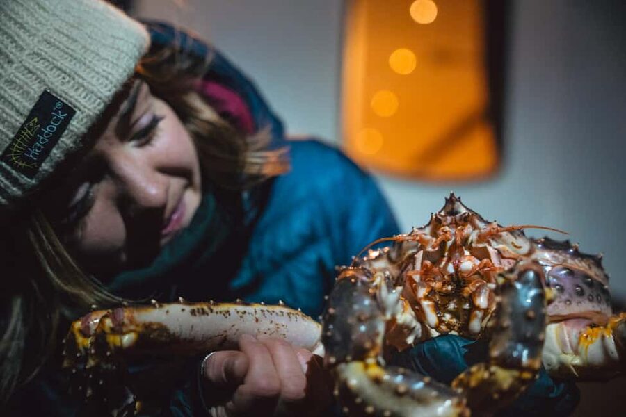 Tromsø: Arctic king crab cruise with self-captured lunch - Timing the work and picture moments, when the “hands-on” becomes memorable