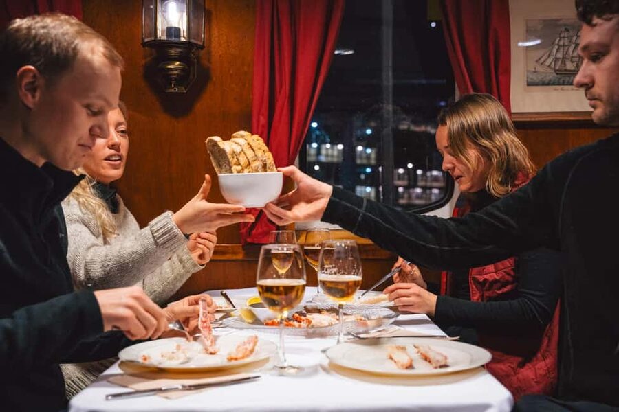 Tromsø: Arctic king crab cruise with self-captured lunch - Lunch at sea, red fish soup plus self-captured king crab claws