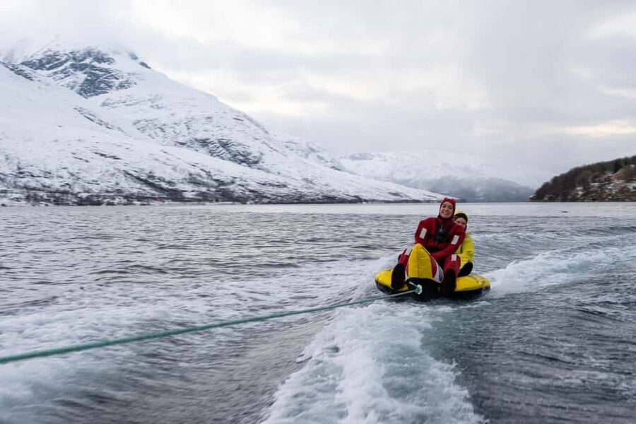 Tromsø: Banana Tube Ride with Arctic Floating - Warm Drinks, Food, and the End-of-Ride Comfort