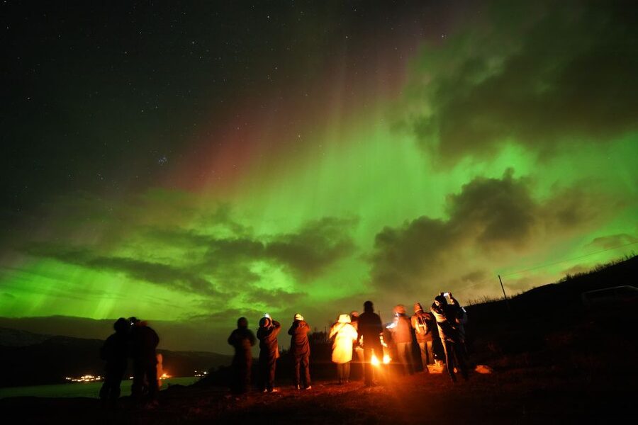 Tromsø: Chase Aurora in Minibus and Free Aurora Portrait - Campsite Waiting Time: Hot Drinks, Lefse, and Arctic Night Stories