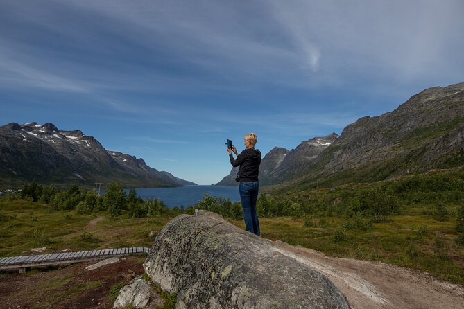Tromso fjords road trip with fire in grill cabin by the beach. - Stop 1 at Grotfjord: white sand, mountains, and a real lunch break