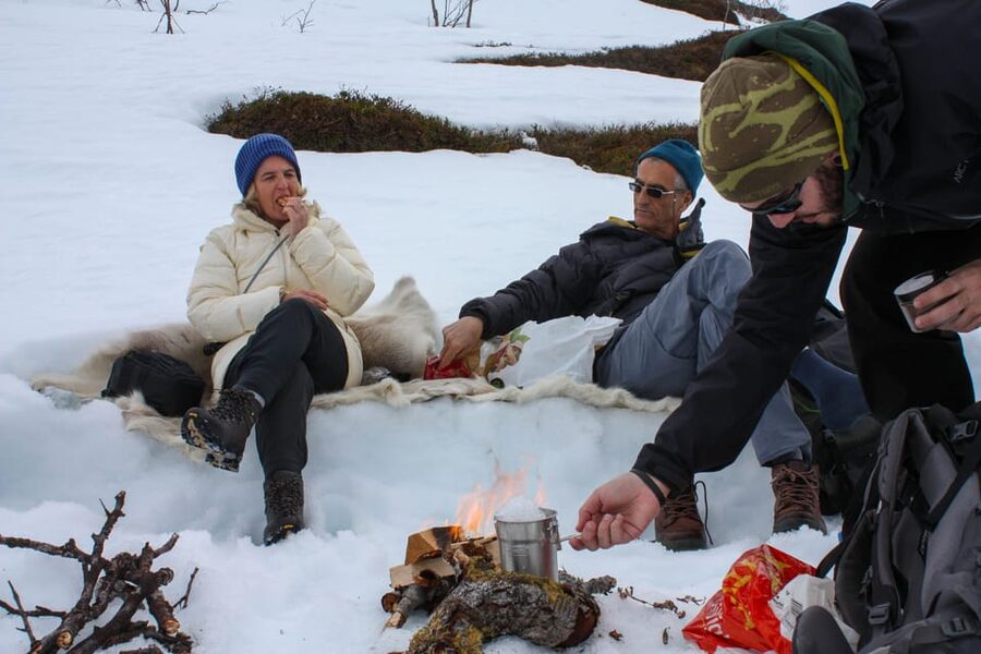 Tromsø: Ice Fishing and Snowshoe Hiking with a Local Guide - Campfire lunch at the lake: warm, eat, then carry on