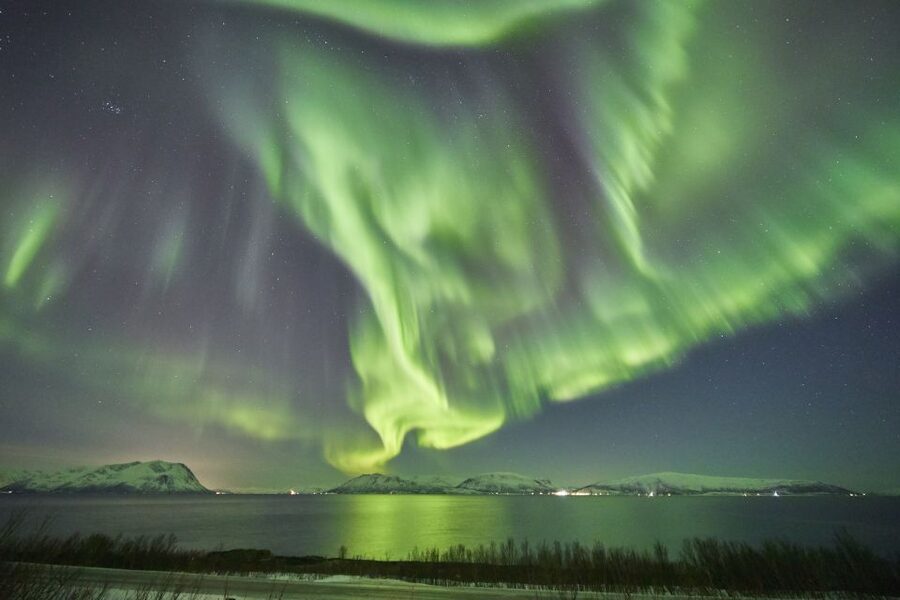 Tromso: Minivan Aurora Excursion with Pictures & Warm Suits - Warm overalls, boots, and tripods: your night-sky kit