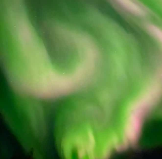 Tromsø: Northern Lights Chase — Small Group Experience - Waiting Warm by Campfire: Reindeer Hides and Hot Drinks