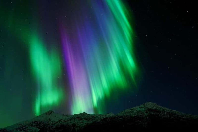 Tromsø: Northern Lights Chase with Local Guide & Free Photos - Chasing clear skies with unlimited distance, often toward the Finland border
