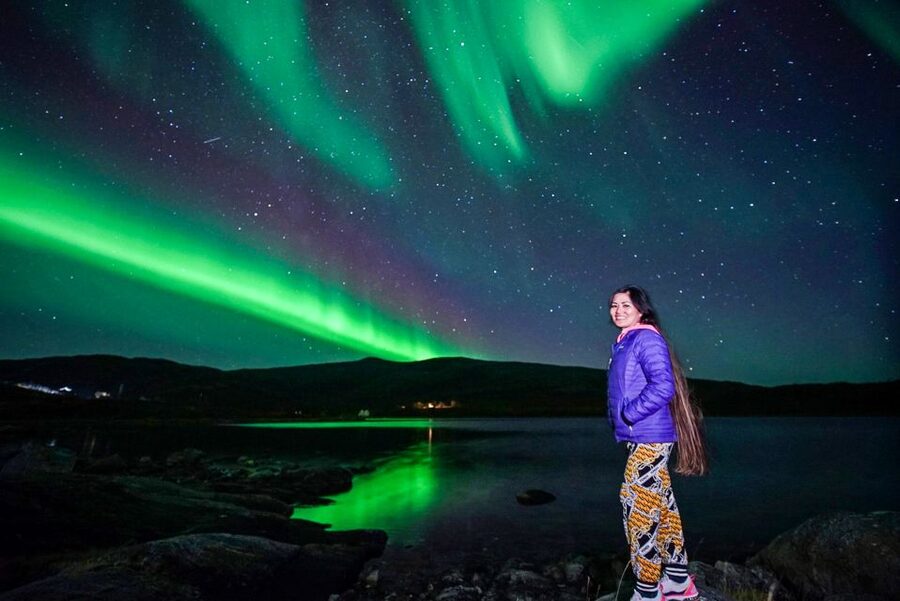 Tromsø: Northern Lights Chase with Photos and Bodysuits - Thermal Suits, Hot Chocolate, Marshmallows, and the Campfire Reality