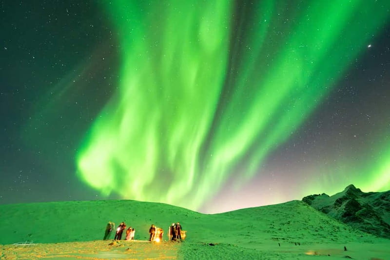 Tromsø: Northern Lights Safari with Expert Guides and Photos - The cozy Arctic camp: thermal suits, hot drinks, and real Aurora talk