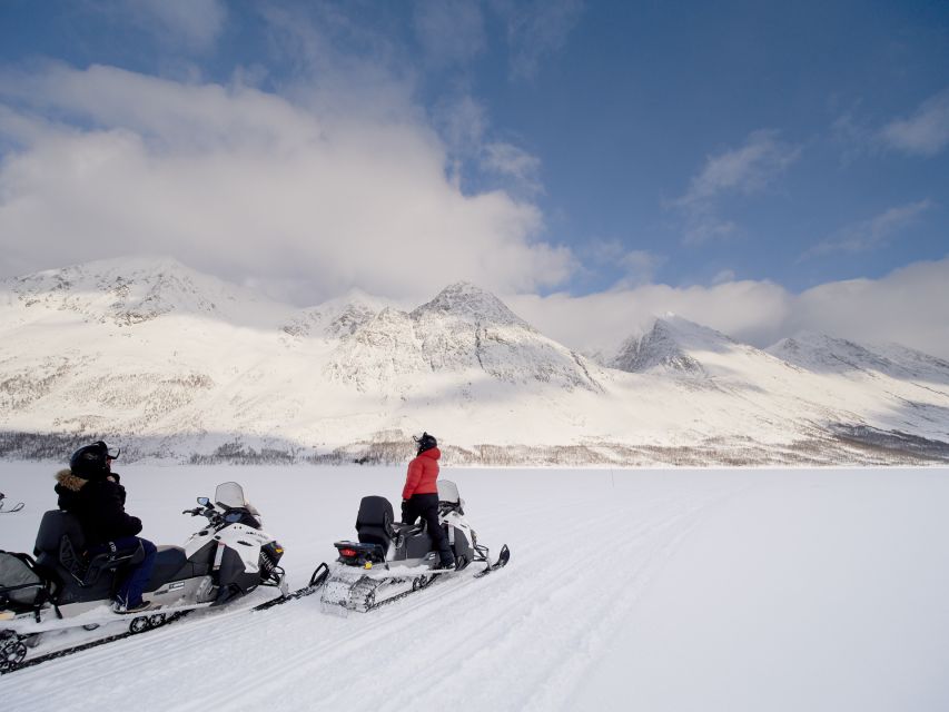 Tromsø: Scenic Arctic snowmobile safari in the Lyngen Alps - Kitted for winter: thermal suit, helmet, and a safety-first briefing