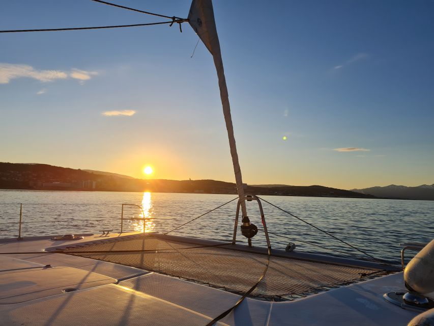 Tromso: Sightseeing Cruise by Catamaran with Snacks & Drinks - Local history that connects the water to real places