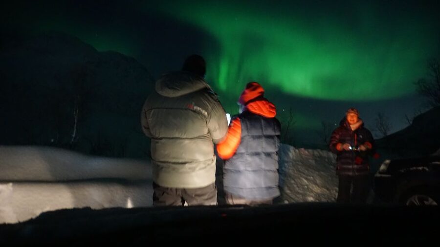 Tromsø: Small group Aurora Borealis - Warm overalls, campfire snacks, and hot chocolate done the right way