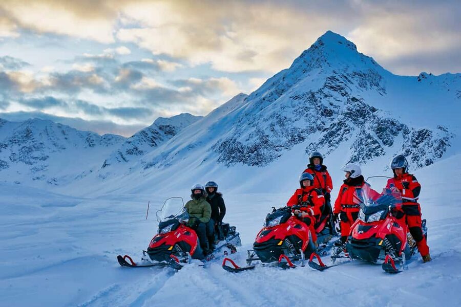 Tromsø: Snowmobile Tour with Aurora Crystal Lavvo Stay - From Tromsø to Basecamp: ferry, van, and changing scenery